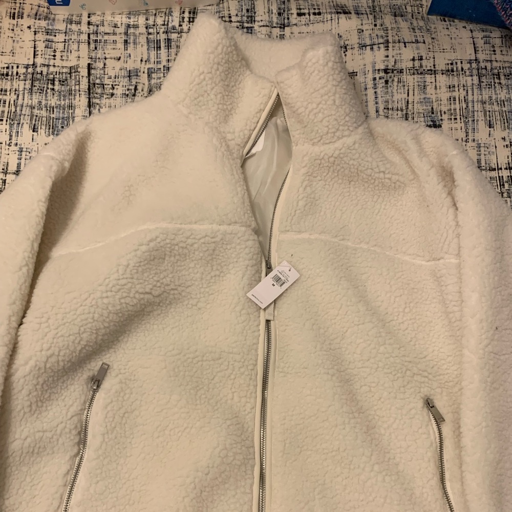 White zip up sweater
